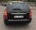 Зеленый Хендай Туксон, объемом двигателя 2 л и пробегом 223 тыс. км за 8500 $, фото 2 на Automoto.ua
