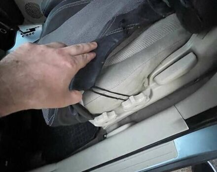 Зеленый Хендай Туксон, объемом двигателя 1.98 л и пробегом 205 тыс. км за 7700 $, фото 10 на Automoto.ua