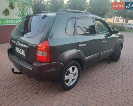 Зеленый Хендай Туксон, объемом двигателя 2 л и пробегом 225 тыс. км за 6100 $, фото 6 на Automoto.ua