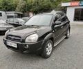 Зеленый Хендай Туксон, объемом двигателя 1.98 л и пробегом 363 тыс. км за 7400 $, фото 1 на Automoto.ua
