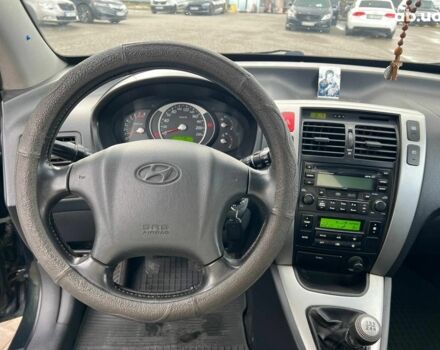 Зеленый Хендай Туксон, объемом двигателя 2 л и пробегом 223 тыс. км за 8540 $, фото 18 на Automoto.ua