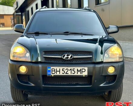 Зеленый Хендай Туксон, объемом двигателя 2 л и пробегом 172 тыс. км за 7000 $, фото 4 на Automoto.ua