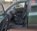 Зеленый Хендай Туксон, объемом двигателя 2 л и пробегом 225 тыс. км за 6100 $, фото 9 на Automoto.ua
