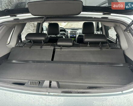 Зелений Хендай Туксон, об'ємом двигуна 2 л та пробігом 248 тис. км за 6999 $, фото 8 на Automoto.ua