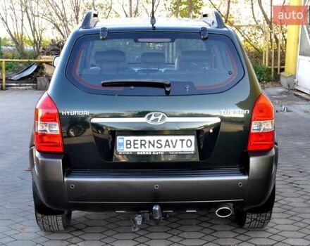 Зеленый Хендай Туксон, объемом двигателя 1.98 л и пробегом 245 тыс. км за 7200 $, фото 9 на Automoto.ua