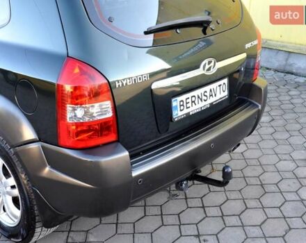 Зеленый Хендай Туксон, объемом двигателя 1.98 л и пробегом 245 тыс. км за 7200 $, фото 40 на Automoto.ua