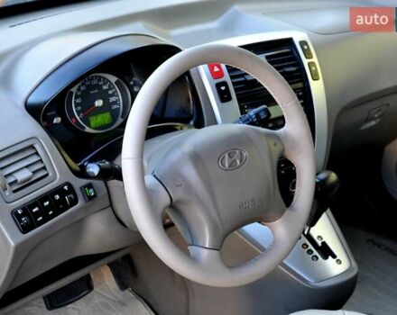 Зеленый Хендай Туксон, объемом двигателя 1.98 л и пробегом 245 тыс. км за 7200 $, фото 16 на Automoto.ua