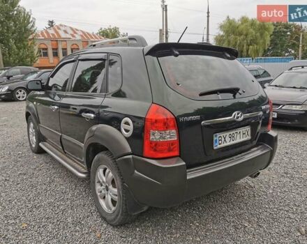 Зеленый Хендай Туксон, объемом двигателя 1.98 л и пробегом 363 тыс. км за 7400 $, фото 12 на Automoto.ua