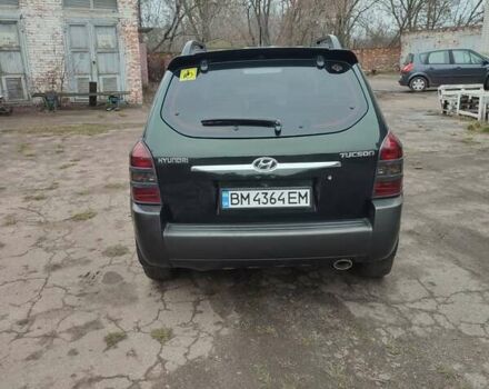 Зеленый Хендай Туксон, объемом двигателя 2 л и пробегом 213 тыс. км за 6500 $, фото 7 на Automoto.ua