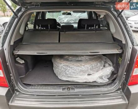 Зеленый Хендай Туксон, объемом двигателя 1.98 л и пробегом 363 тыс. км за 7400 $, фото 38 на Automoto.ua