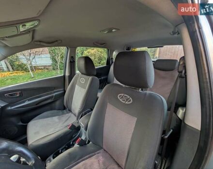 Зеленый Хендай Туксон, объемом двигателя 1.98 л и пробегом 200 тыс. км за 8000 $, фото 8 на Automoto.ua