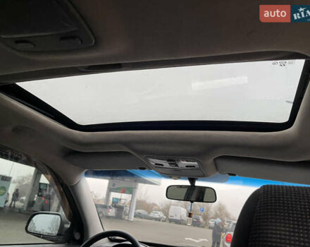 Зеленый Хендай Туксон, объемом двигателя 1.98 л и пробегом 295 тыс. км за 5950 $, фото 22 на Automoto.ua