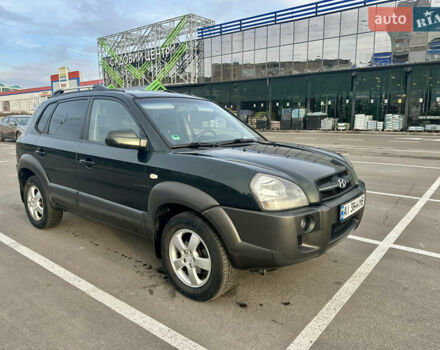 Зелений Хендай Туксон, об'ємом двигуна 1.98 л та пробігом 156 тис. км за 7999 $, фото 6 на Automoto.ua