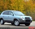 Зеленый Хендай Туксон, объемом двигателя 2 л и пробегом 115 тыс. км за 9700 $, фото 3 на Automoto.ua