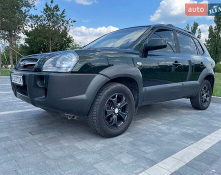 Зеленый Хендай Туксон, объемом двигателя 1.98 л и пробегом 180 тыс. км за 9200 $, фото 9 на Automoto.ua