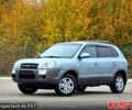 Зеленый Хендай Туксон, объемом двигателя 2 л и пробегом 115 тыс. км за 9700 $, фото 1 на Automoto.ua