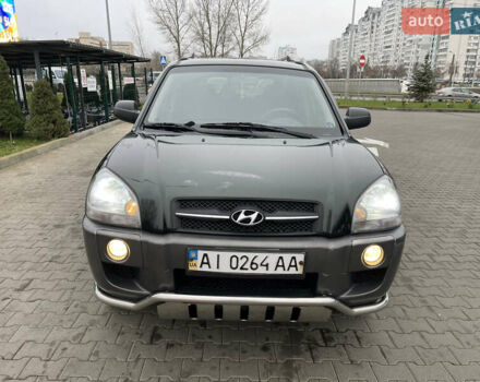 Зеленый Хендай Туксон, объемом двигателя 1.98 л и пробегом 295 тыс. км за 5950 $, фото 29 на Automoto.ua