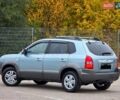 Зеленый Хендай Туксон, объемом двигателя 2 л и пробегом 115 тыс. км за 9700 $, фото 3 на Automoto.ua