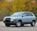 Зеленый Хендай Туксон, объемом двигателя 2 л и пробегом 115 тыс. км за 9700 $, фото 1 на Automoto.ua