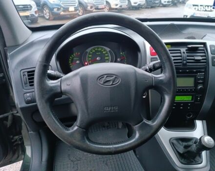 Зеленый Хендай Туксон, объемом двигателя 2 л и пробегом 223 тыс. км за 7290 $, фото 19 на Automoto.ua