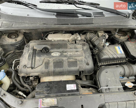 Зеленый Хендай Туксон, объемом двигателя 1.98 л и пробегом 295 тыс. км за 5950 $, фото 34 на Automoto.ua