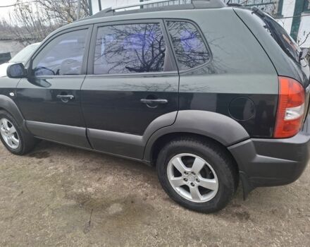 Зеленый Хендай Туксон, объемом двигателя 2 л и пробегом 228 тыс. км за 6500 $, фото 4 на Automoto.ua