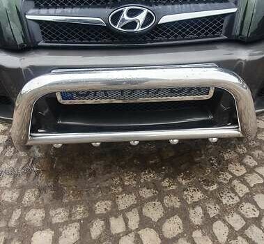 Зеленый Хендай Туксон, объемом двигателя 2 л и пробегом 115 тыс. км за 8500 $, фото 15 на Automoto.ua