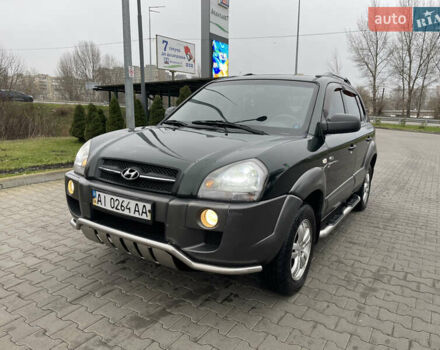 Зеленый Хендай Туксон, объемом двигателя 1.98 л и пробегом 295 тыс. км за 5950 $, фото 1 на Automoto.ua