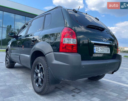 Зеленый Хендай Туксон, объемом двигателя 1.98 л и пробегом 180 тыс. км за 9200 $, фото 7 на Automoto.ua