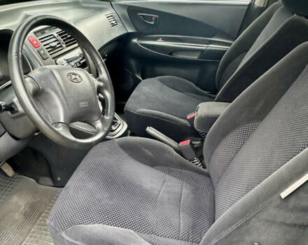 Зелений Хендай Туксон, об'ємом двигуна 1.98 л та пробігом 156 тис. км за 7999 $, фото 11 на Automoto.ua