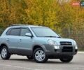 Зеленый Хендай Туксон, объемом двигателя 2 л и пробегом 115 тыс. км за 9700 $, фото 4 на Automoto.ua