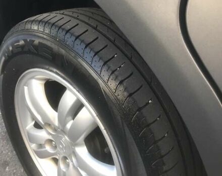 Зеленый Хендай Туксон, объемом двигателя 1.99 л и пробегом 93 тыс. км за 8700 $, фото 2 на Automoto.ua