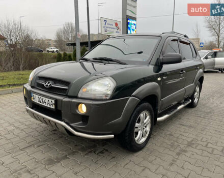 Зеленый Хендай Туксон, объемом двигателя 1.98 л и пробегом 295 тыс. км за 5950 $, фото 13 на Automoto.ua