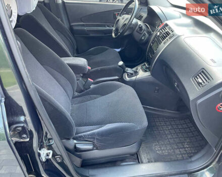 Зеленый Хендай Туксон, объемом двигателя 1.98 л и пробегом 180 тыс. км за 9200 $, фото 10 на Automoto.ua