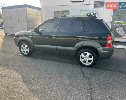 Зеленый Хендай Туксон, объемом двигателя 1.98 л и пробегом 130 тыс. км за 9100 $, фото 5 на Automoto.ua