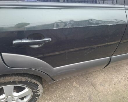 Зеленый Хендай Туксон, объемом двигателя 2 л и пробегом 228 тыс. км за 6500 $, фото 12 на Automoto.ua