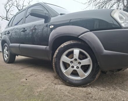 Зеленый Хендай Туксон, объемом двигателя 2 л и пробегом 228 тыс. км за 6500 $, фото 3 на Automoto.ua