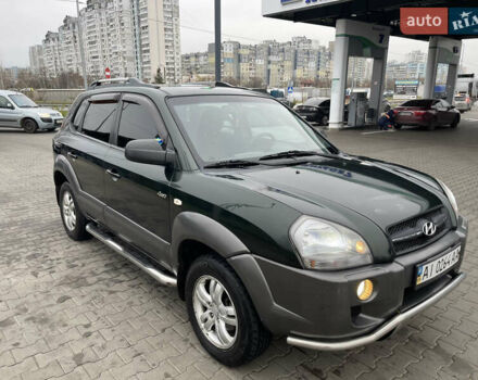 Зеленый Хендай Туксон, объемом двигателя 1.98 л и пробегом 295 тыс. км за 5950 $, фото 30 на Automoto.ua