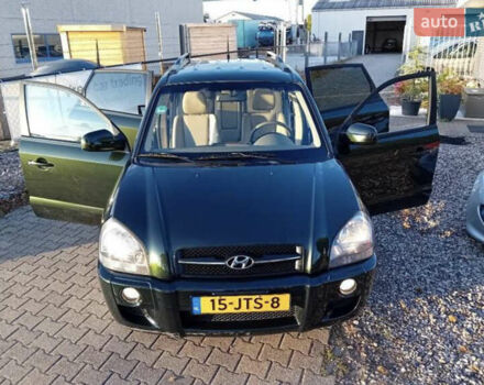 Зеленый Хендай Туксон, объемом двигателя 2 л и пробегом 183 тыс. км за 8900 $, фото 12 на Automoto.ua