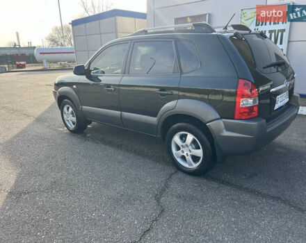 Зеленый Хендай Туксон, объемом двигателя 1.98 л и пробегом 130 тыс. км за 9100 $, фото 2 на Automoto.ua