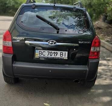 Зелений Хендай Туксон, об'ємом двигуна 1.98 л та пробігом 206 тис. км за 7100 $, фото 4 на Automoto.ua