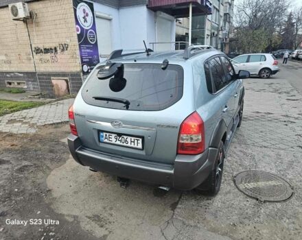 Зелений Хендай Туксон, об'ємом двигуна 2 л та пробігом 150 тис. км за 8331 $, фото 3 на Automoto.ua