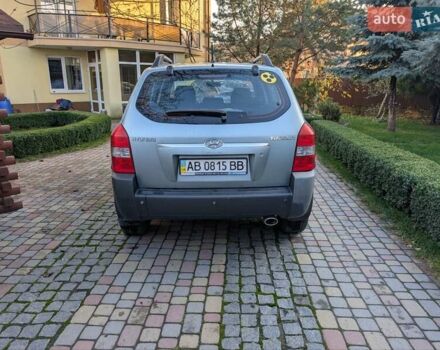 Зеленый Хендай Туксон, объемом двигателя 1.98 л и пробегом 200 тыс. км за 8000 $, фото 3 на Automoto.ua