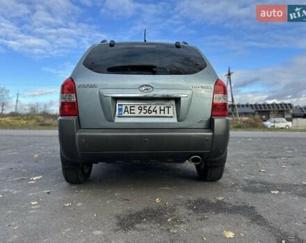 Зеленый Хендай Туксон, объемом двигателя 1.98 л и пробегом 168 тыс. км за 8800 $, фото 31 на Automoto.ua