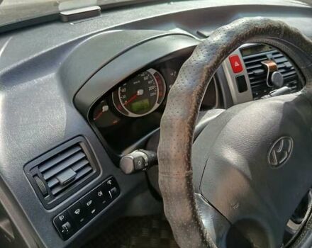 Зеленый Хендай Туксон, объемом двигателя 2 л и пробегом 140 тыс. км за 8800 $, фото 7 на Automoto.ua