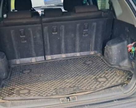 Зелений Хендай Туксон, об'ємом двигуна 1.98 л та пробігом 294 тис. км за 5500 $, фото 7 на Automoto.ua