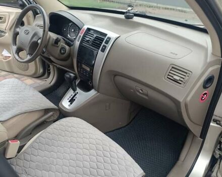 Зелений Хендай Туксон, об'ємом двигуна 1.98 л та пробігом 132 тис. км за 8300 $, фото 4 на Automoto.ua