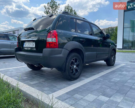 Зеленый Хендай Туксон, объемом двигателя 1.98 л и пробегом 180 тыс. км за 9200 $, фото 5 на Automoto.ua