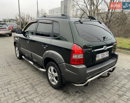 Зеленый Хендай Туксон, объемом двигателя 1.98 л и пробегом 295 тыс. км за 5950 $, фото 32 на Automoto.ua
