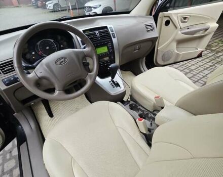 Зеленый Хендай Туксон, объемом двигателя 1.98 л и пробегом 178 тыс. км за 8900 $, фото 37 на Automoto.ua